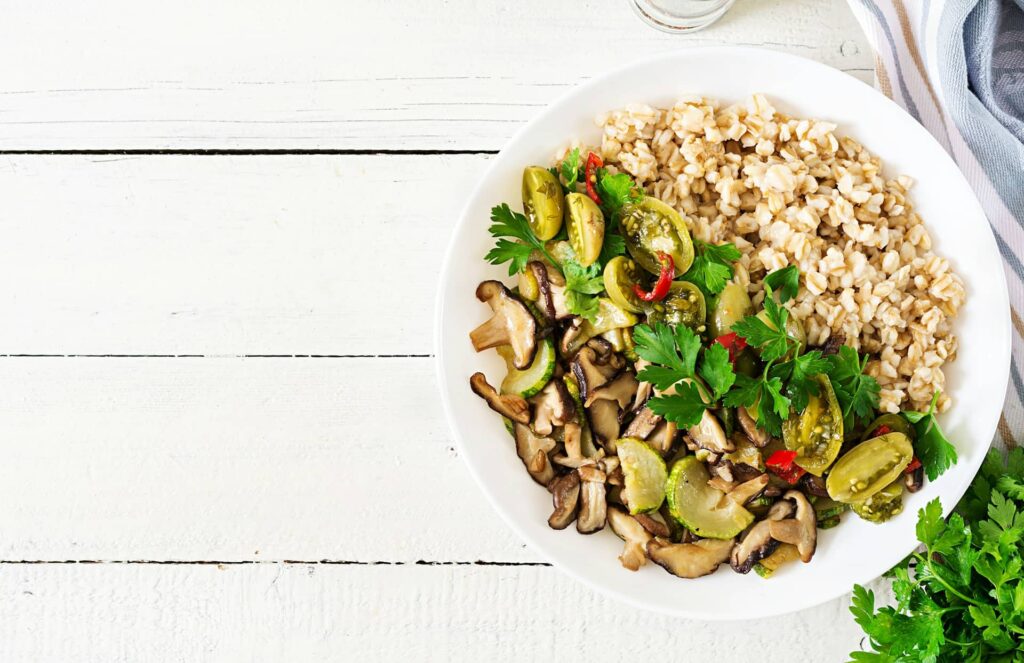 Healthy Vegetarian Meal Mushrooms Shiitake Zucchini And Oatmeal Porridge 1024x663